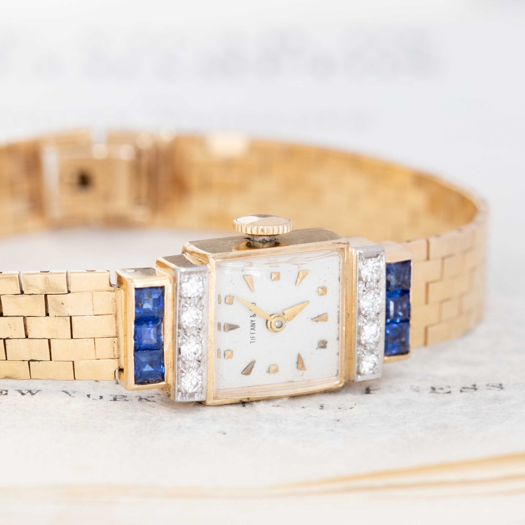 Close-up of Tiffany ladies’ watch featuring sapphire baguettes