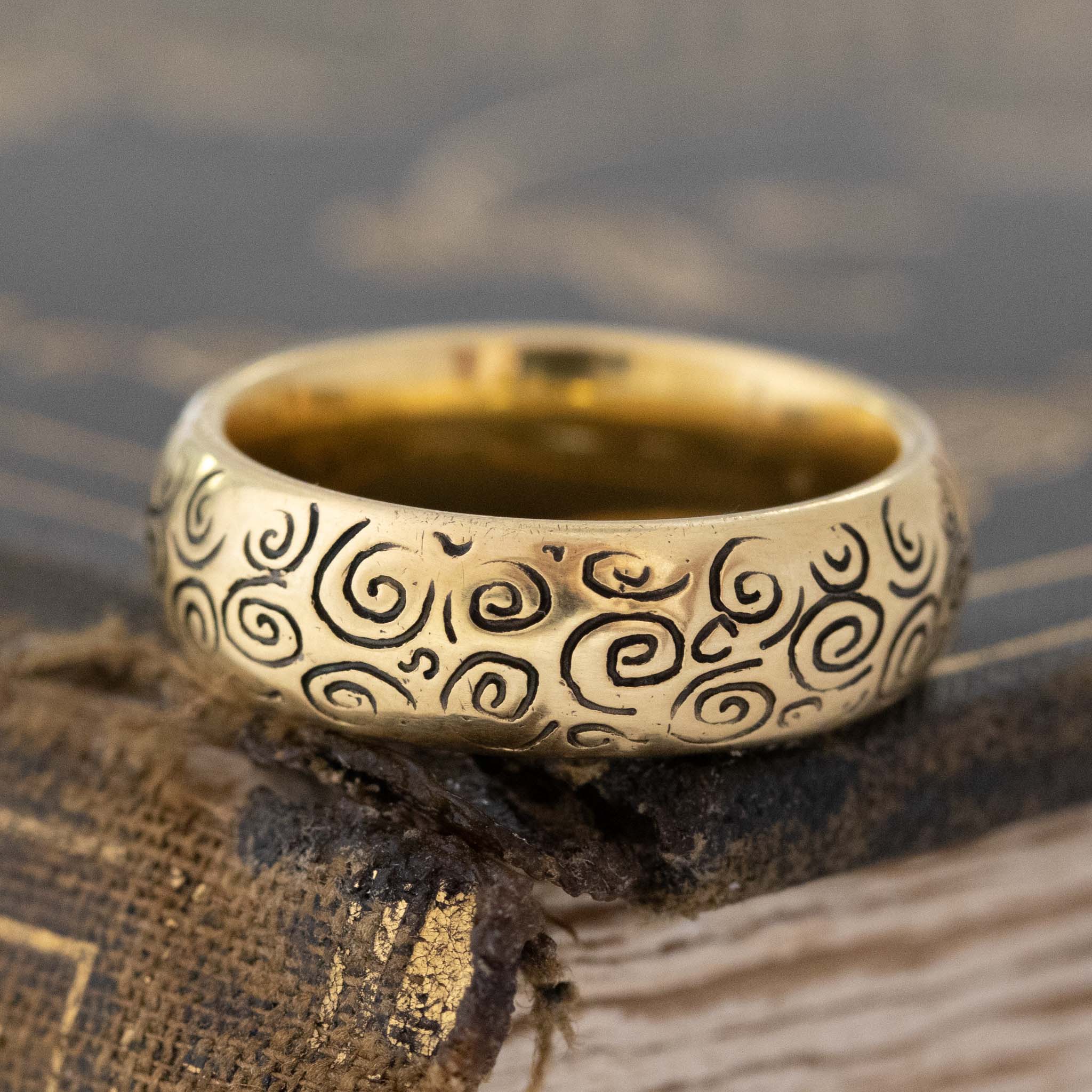 18kt yellow gold designer band with swirls by MC Paris with