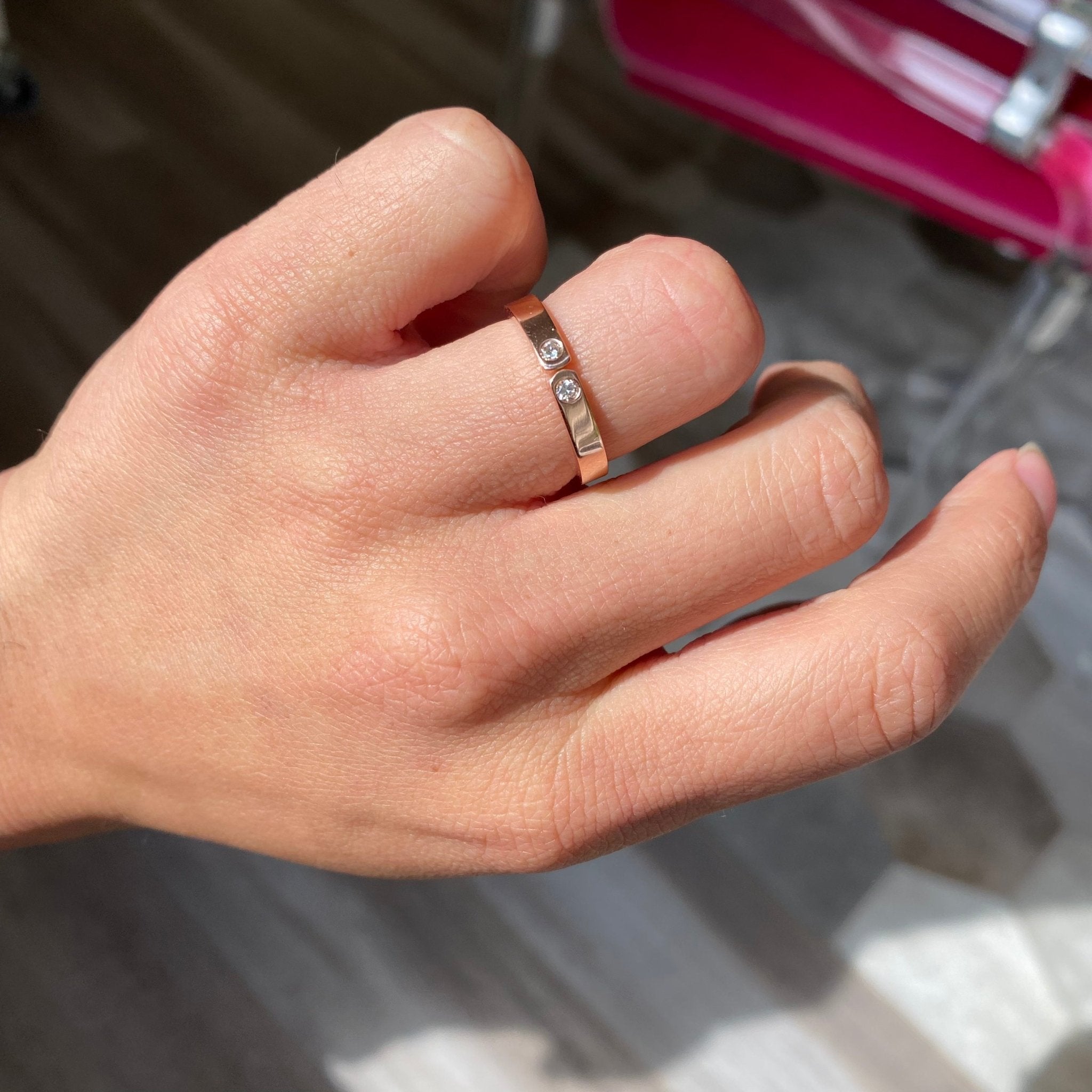 A sweet diamond stacker band, fitted with two sparkly diamonds and an open top! 