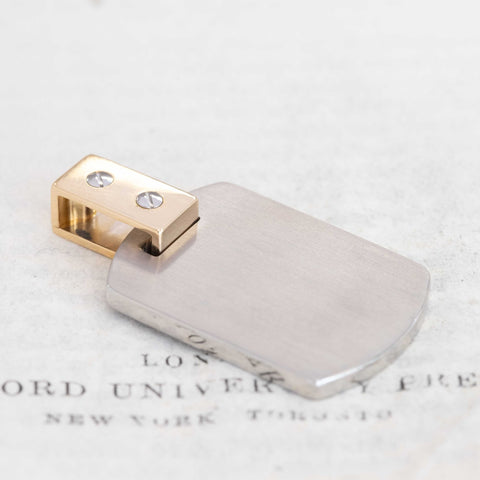 Two-Tone Dog Tag Pendant, by Cartier