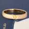 18kt yellow gold wedding band with a V carved in the middle by Louis Vuitton
