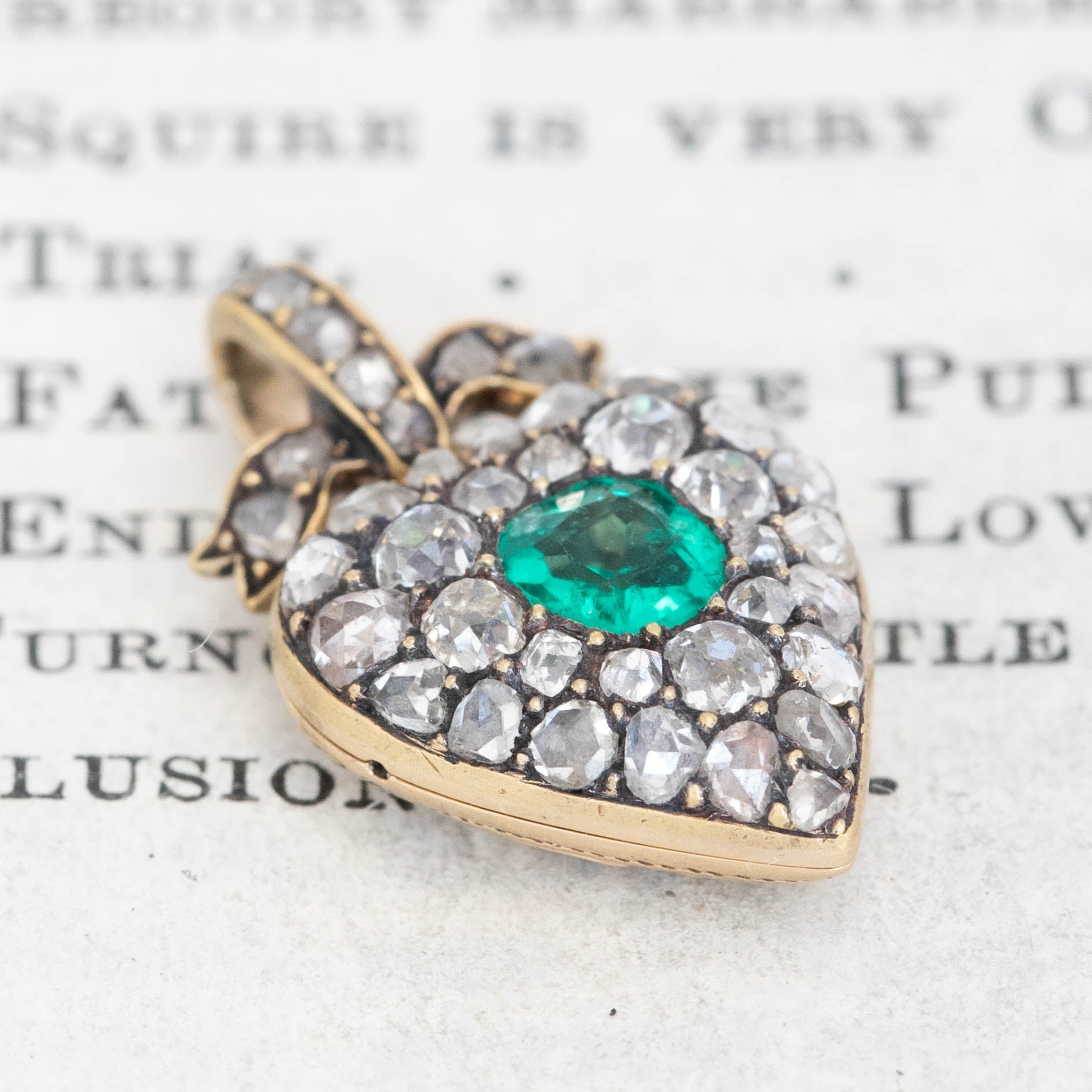 Old cut diamond and emerald Victorian locket