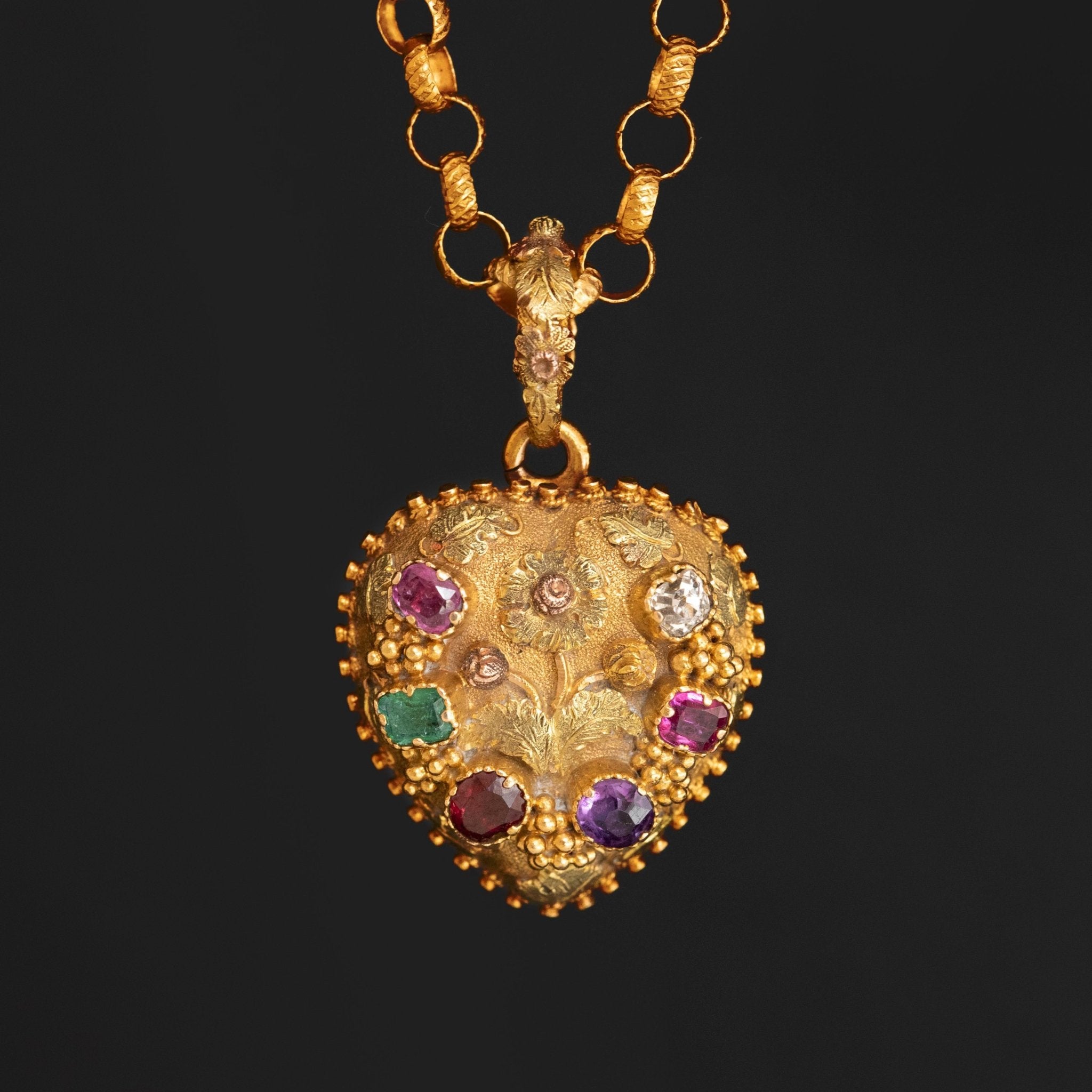 Antique Victorian gold heart locket pendant with ruby emerald amethyst and diamond