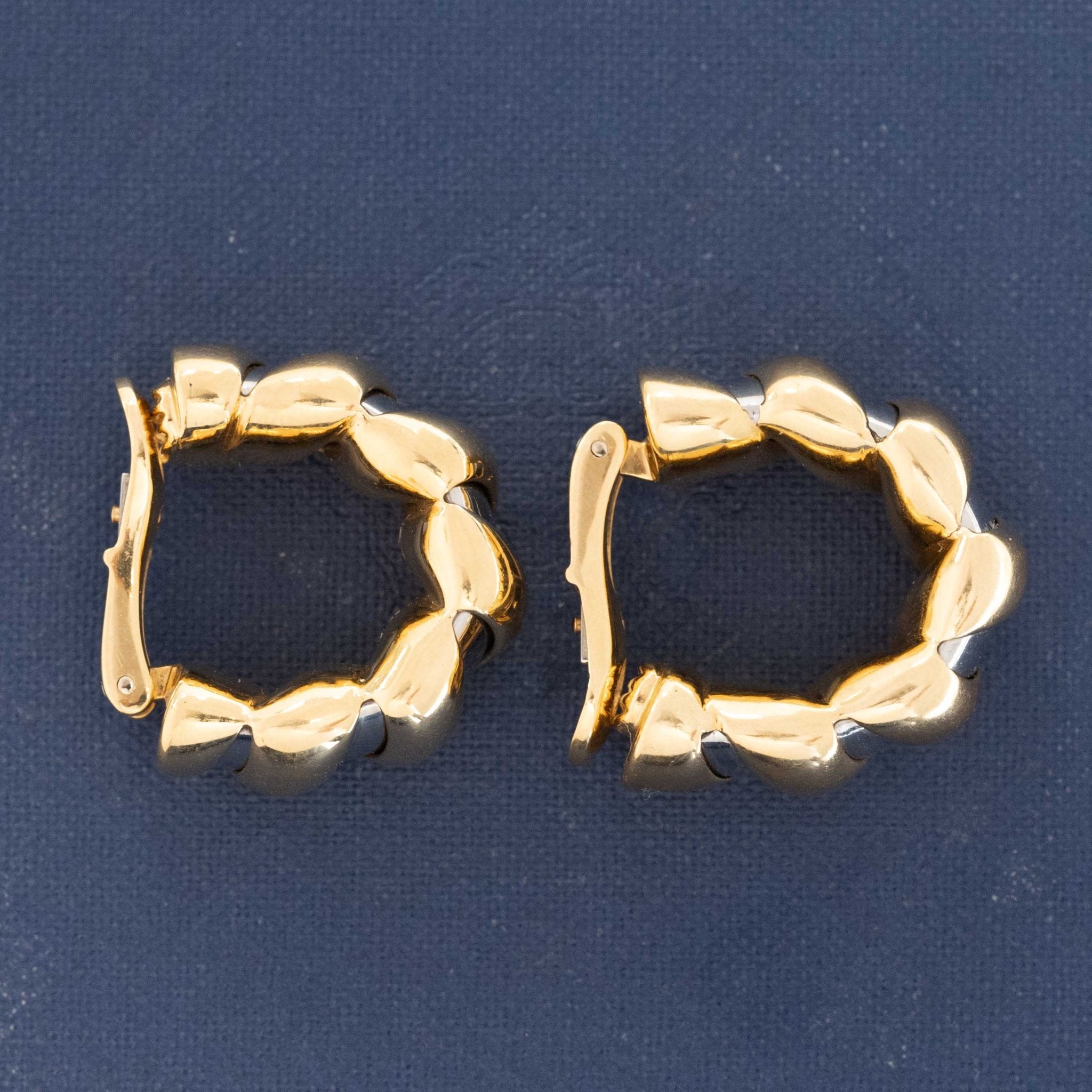Vintage Bulgari 18k yellow and white gold Tubogas earrings close-up