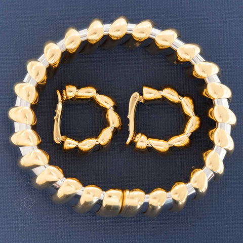 Sculptural Bulgari Tubogas hoops with twisted gold design