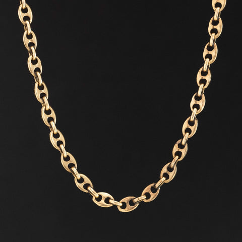 Vintage 14k yellow gold 30-inch mariner link chain necklace on white background

Long 14kt yellow gold mariner link chain, 3.25mm wide, vintage design