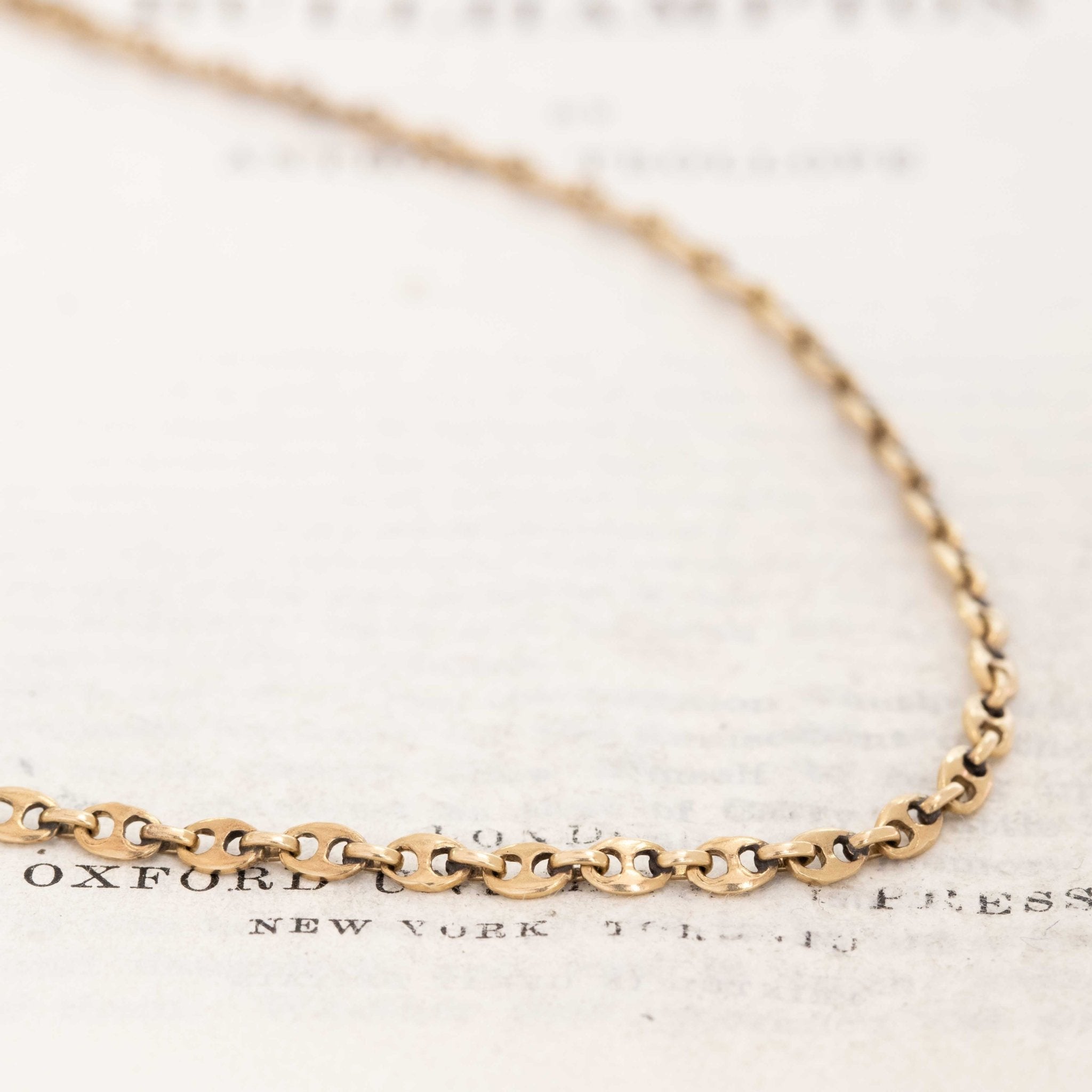 Close-up of vintage gold mariner link necklace, 30 inch length