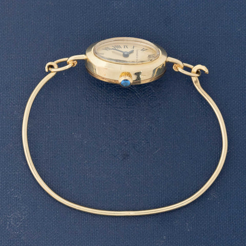 Oval Roman numeral Tiffany watch in 14k gold