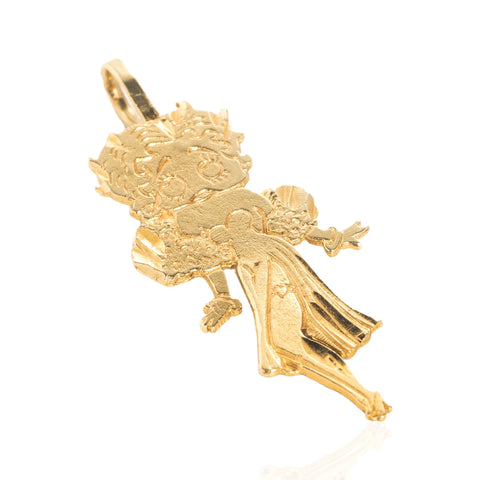 A collectible vintage gold pendant charm shaped like cartoon character, Betty Boop, shown on a plain white background.