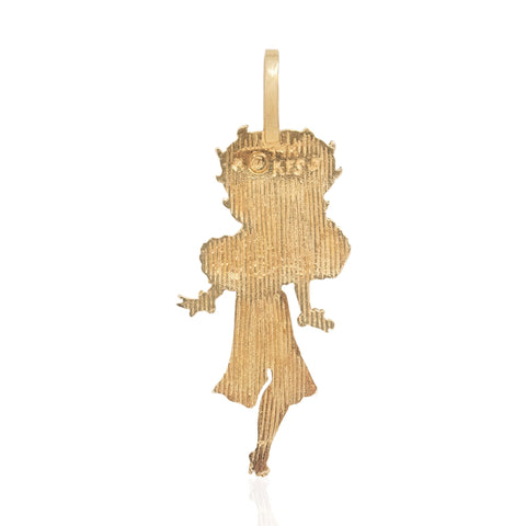 Backside of a vintage gold pendant charm shaped like cartoon character, Betty Boop, shown on a plain white background.