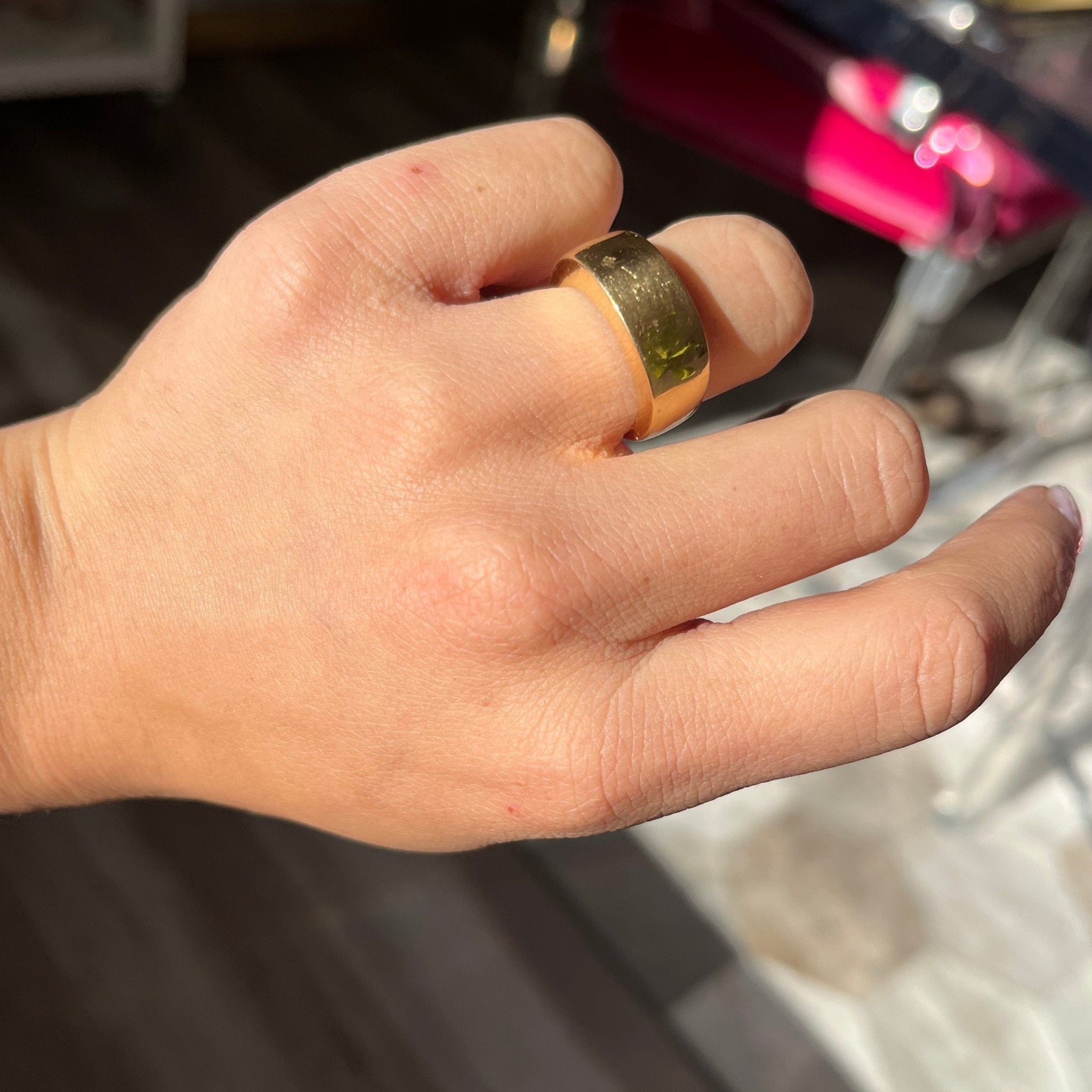 vintage gold band on finger