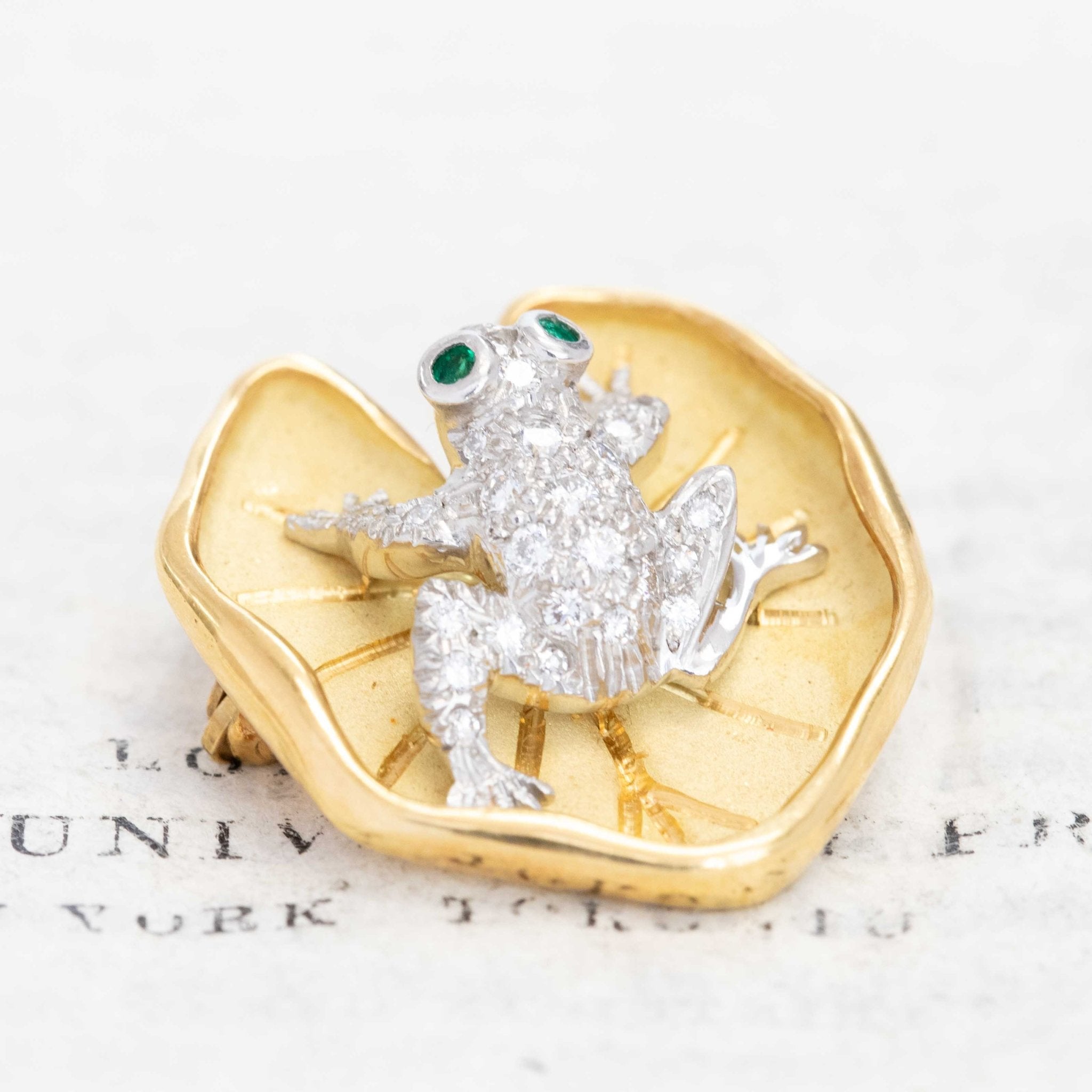 Midcentury animal motif brooch with diamonds and emeralds