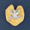 Vintage gold frog-on-lily-pad brooch with diamond pavé and emerald eyes