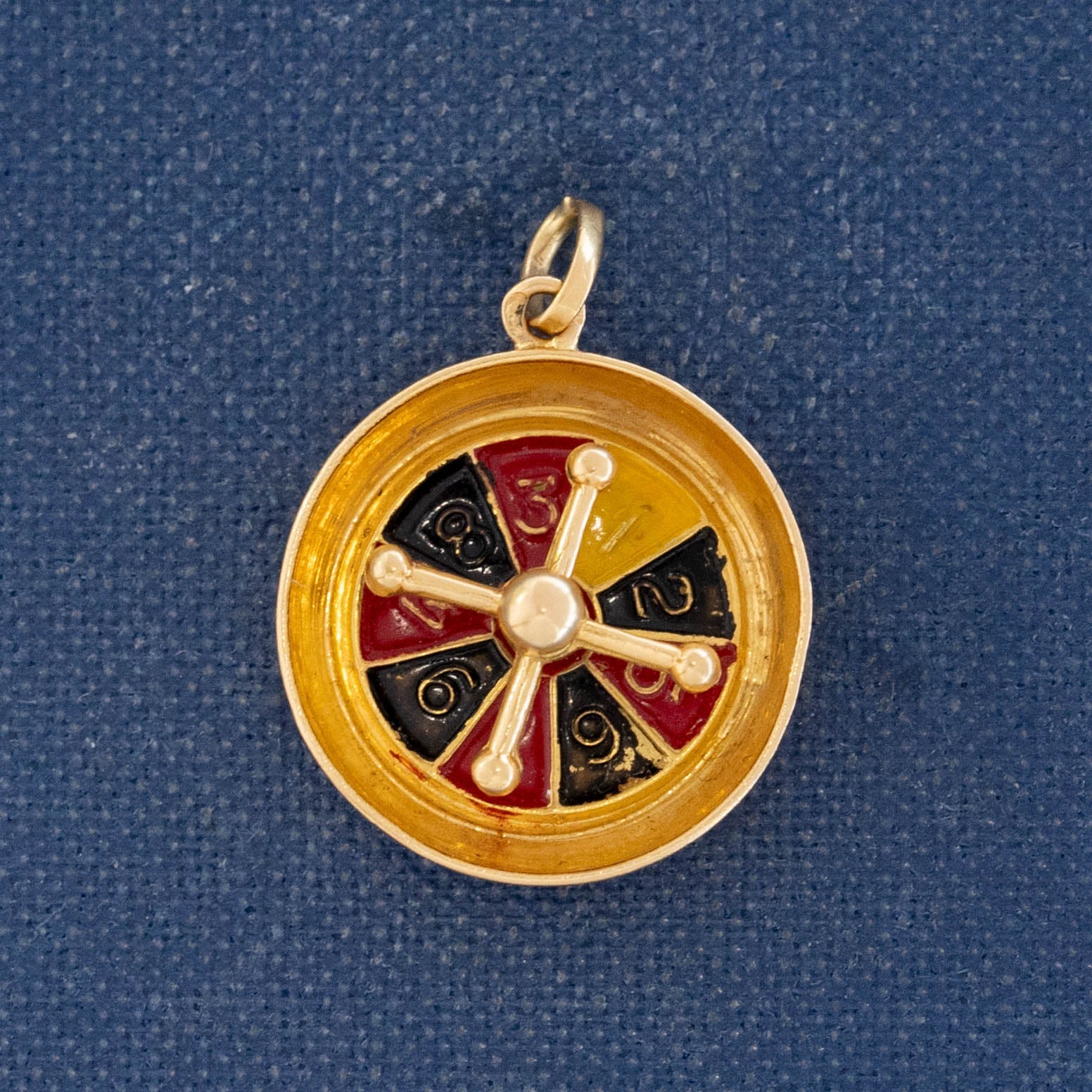 Vintage French roulette charm in gold with casino wheel design