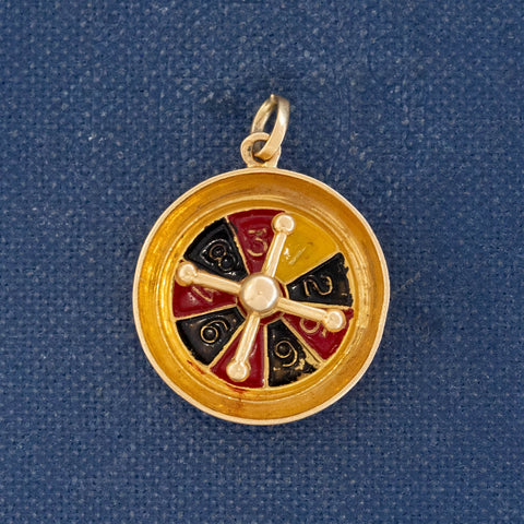 Vintage French roulette charm in gold with casino wheel design