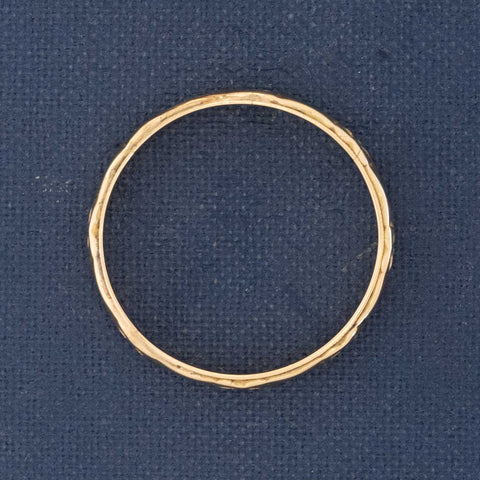 Side profile of vintage heirloom-quality 14kt gold wedding band with history.