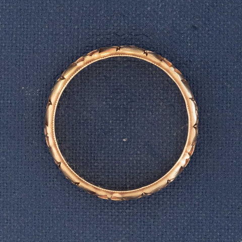 Side profile of collectible 14kt gold vintage wedding band, timeless jewelry.