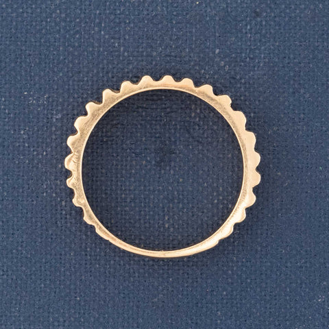 Side view of vintage fluted band ring showing fluted pattern