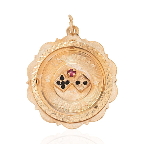Vintage Las Vegas Nevada dice medallion in 14kt yellow gold with pink stone