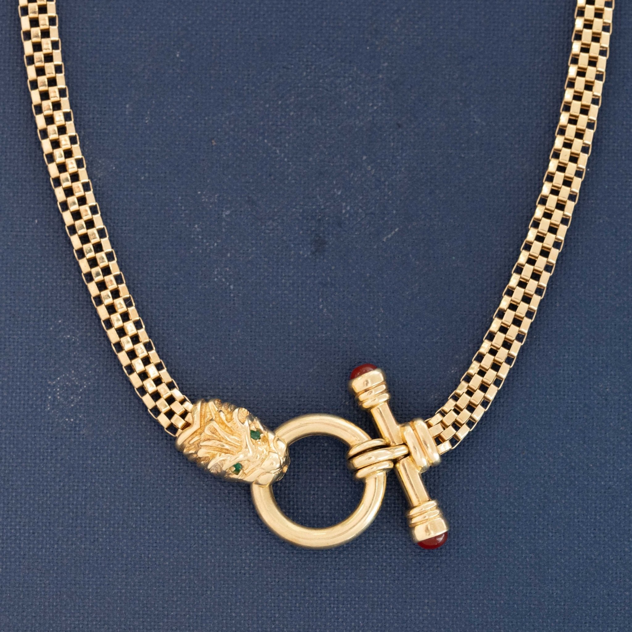 14K gold lion head necklace with gemstone eyes