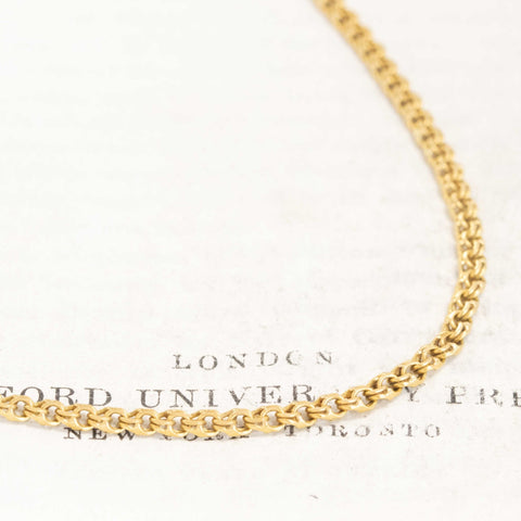 Cartier signature mark on 18 kt gold fancy link chain side view