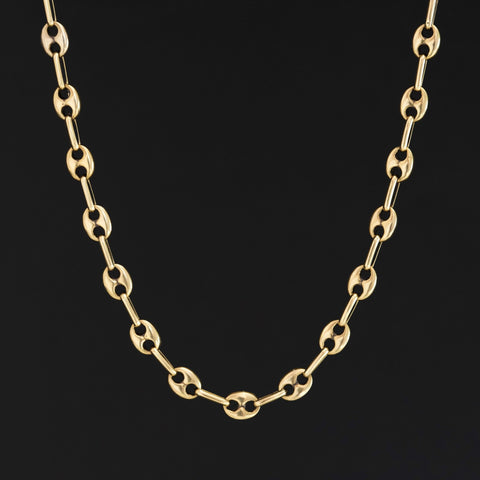 16-inch vintage mariner chain in solid yellow gold, 15 grams

Detailed view of Italian 14kt gold anchor link necklace, vintage fine jewelry