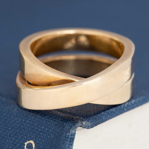 Cartier Nouvelle vintage band, chunky crossover design in polished yellow gold.