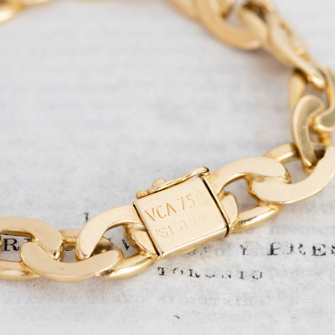 Detail of signature VCA France mark / hallmark on gold oval link bracelet