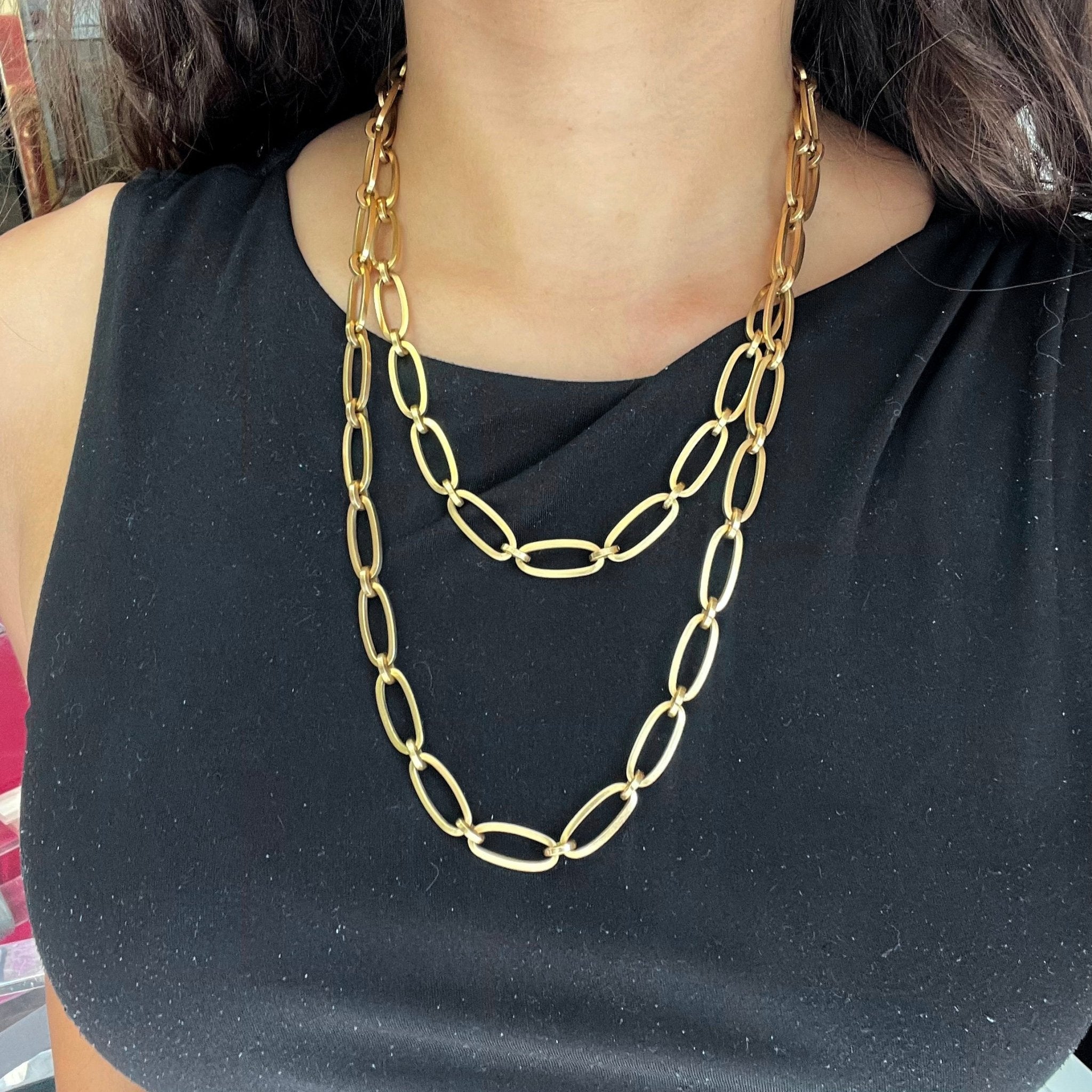 Close-up of Cartier oval link chain, solid links