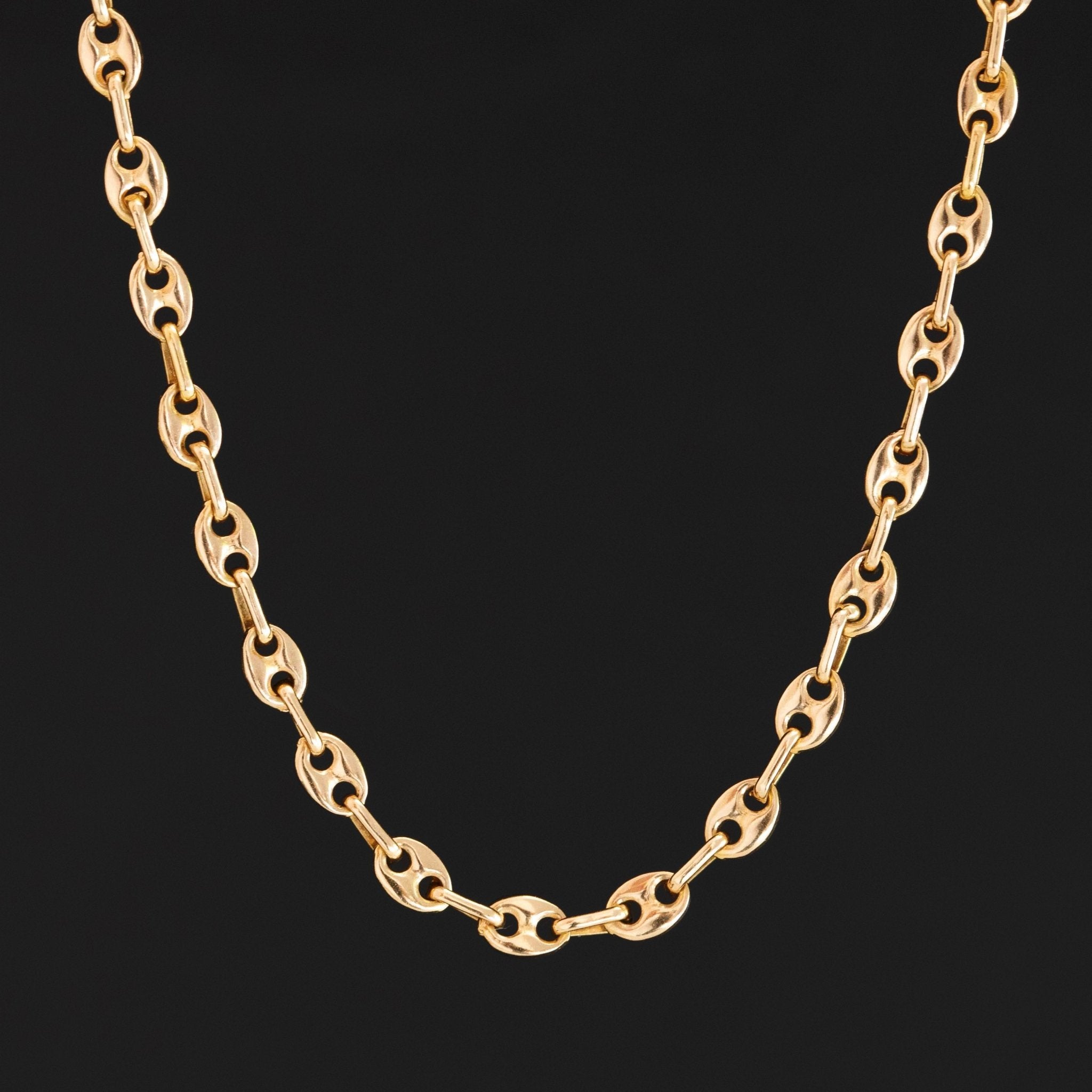 Vintage yellow gold mariner chain necklace styled for layering

Classic 14k gold mariner link chain, vintage fine jewelry piece