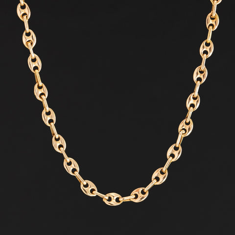Vintage yellow gold mariner chain necklace styled for layering

Classic 14k gold mariner link chain, vintage fine jewelry piece