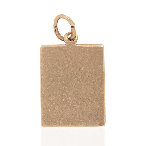 The backside of a rectangular Vintage Report Card gold pendant charm with a textured, matte finish and a small hanging loop at the top, shown on a clean white background.