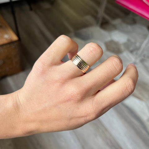 vintage triple tone 5 row 14kt gold wedding band on finger