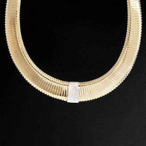 close-up vintage tubogas necklace coil detail two-tone gold