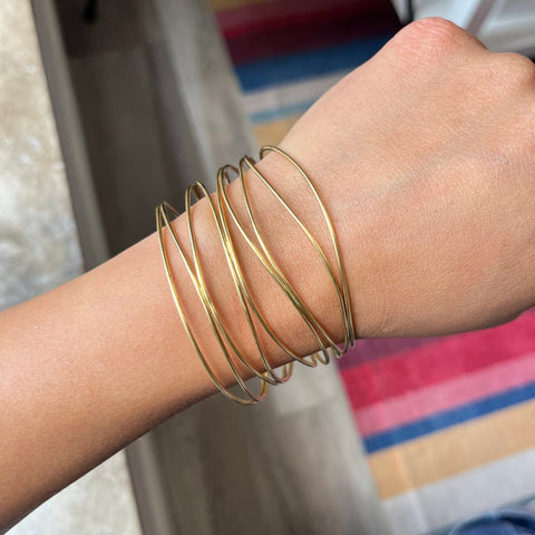 Elsa Peretti Wave Nine-row Bangle, by Tiffany & Co.