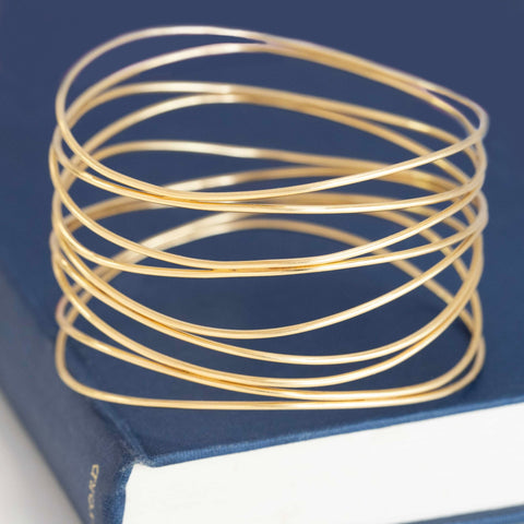 Elsa Peretti Wave Nine-row Bangle, by Tiffany & Co.