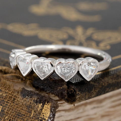 Antique lovers’ .93ctw Heart Cut Diamond 5-Stone Bezel Band in platinum, featuring rare Earth-mined Antique Diamonds