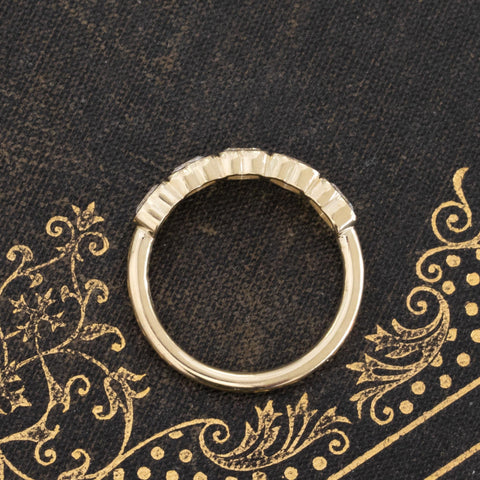Side view of .93ctw Heart Cut Diamond 5-Stone Bezel Band, natural Earth-mined Antique Diamonds in yellow gold