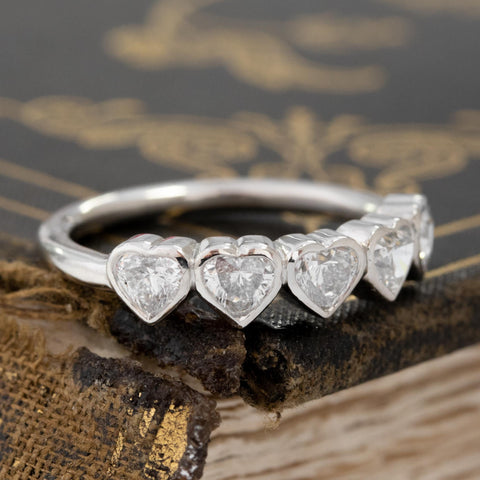 Close-up of .93ctw Heart Cut Diamond 5-Stone Bezel Band, vintage-inspired band with Antique Diamonds, crafted in platinum