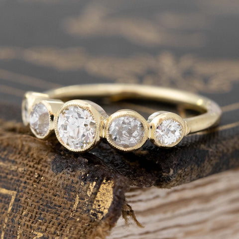 Antique lovers’ .93ctw Old European Cut Diamond Graduated 5-Stone Band in yellow gold, featuring rare Earth-mined Old Mine Cut Diamonds