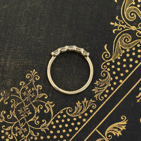 Side view of .94ctw Asscher Cut Diamond 5-Stone Band, vintage-inspired band with Antique Diamonds, crafted in yellow gold