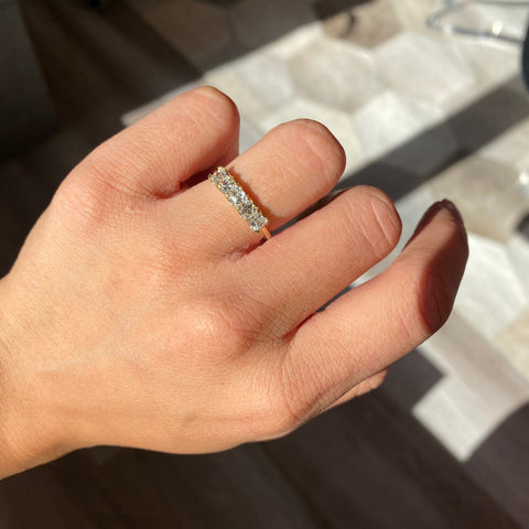 Elegant .94ctw Asscher Cut Diamond 5-Stone Band, romantic design with Antique Diamonds, Earth-mined diamonds in yellow gold shown on ring finger