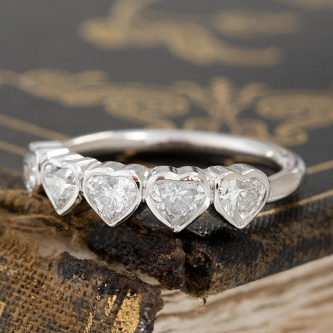 Antique lovers’ .96ctw Heart Cut Diamond 5-Stone Bezel Band in platinum, featuring rare Earth-mined Antique Diamonds
